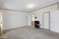 124 Zack Circle, Elizabeth City, NC 27909 — 3-bedroom manufactured home in Red Oak, Elizabeth City, NC, photo 14 of 36: Primary Bedroom