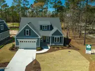 284 Atlantic Court SW, Supply, NC 28462 — 3-bedroom waterfront home in Lockwood Folly, Supply, NC, photo 3 of 47: Front