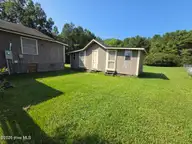258 Hideaway Road, Belhaven, NC 27810 — 2-bedroom waterfront home in Sportsmans Hide-Away, Belhaven, NC, photo 12 of 48: 012 Rear yard with shed