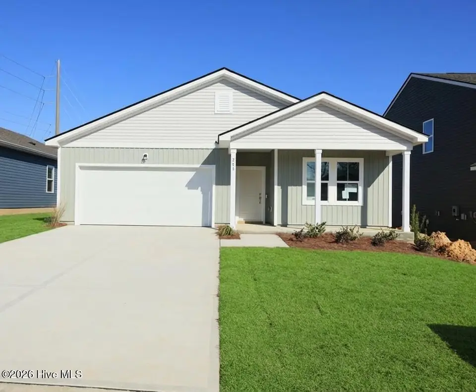 208 Ocean Pointe Boulevard SE 5301, Bolivia, NC 28422 — 4-bedroom home in Ocean Pointe, Bolivia, NC, photo 1 of 17: front-mls