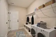 63 Waterfall Lane, Whiteville, NC 28472 — 4-bedroom waterfront home in Waterfall Estates, Whiteville, NC, photo 20 of 22: Laundry Room