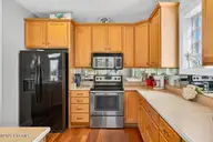 43 Private Drive, Ocean Isle Beach, NC 28469 — 5-bedroom waterfront home in Summer Place, Ocean Isle Beach, NC, photo 9 of 49: Kitchen
