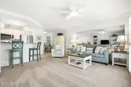 908 Resort Circle Unit 906, Sunset Beach, NC 28468 — 1-bedroom condo in Colony II, Sunset Beach, NC, photo 10 of 35: Bright, main living