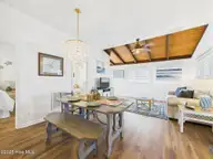 117 Salisbury Street, Holden Beach, NC 28462 — 3-bedroom waterfront home, Holden Beach, NC, photo 7 of 40: Living/Dining