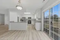 4010 Timmerman Drive, Elizabeth City, NC 27909 — 3-bedroom home in Country Village, Elizabeth City, NC, photo 10 of 46: 4010 Timmerman Dining area and sliding