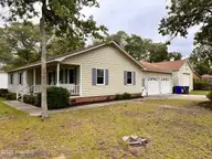 1506 E Oak Island Drive, Oak Island, NC 28465 — 3-bedroom home in Tranquil Harbour Island, Oak Island, NC, photo 2 of 56