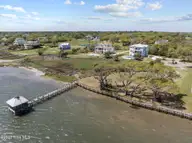 Lot 21r Shipyard Lane, Hampstead, NC 28443 — waterfront lot in Sloop Point Plantation, Hampstead, NC, photo 21 of 36: 15-web-or-mls-DJI_20250409112018_0116_D
