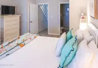 201 Freeman Lane C, Atlantic Beach, NC 28512 — 2-bedroom waterfront townhome in Club Colony, Atlantic Beach, NC, photo 24 of 33: Bedroom 2