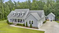 2703 E Fairway Road, Morehead City, NC 28557 — 3-bedroom home in Country Club East, Morehead City, NC, photo 3 of 71: 3-web-or-mls-2703-E-Fairway-DRONE-6-29-2