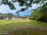 120 Kings Road, Whiteville, NC 28472 — 2-bedroom home in Duchess Forrest, Whiteville, NC, photo 4 of 25: Back Yard View
