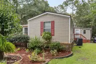 721 Blue Sail Drive SE, Bolivia, NC 28422 — 2-bedroom manufactured home in River Run Plantation, Bolivia, NC, photo 2 of 59: 2_front exterior