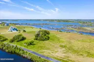 23 23 Hunter Heath Drive, North Topsail Beach, NC 28460 — waterfront lot in Ashe Island Farm, North Topsail Beach, NC, photo 14 of 20: 23HHside