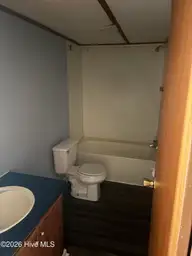 1934 Creswell Place SW, Supply, NC 28462 — 2-bedroom manufactured home in Styrons Landing, Supply, NC, photo 6 of 17: Front Bathroom