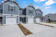 38 W Farley Drive 96, Hampstead, NC 28443 — 3-bedroom townhome in Brookfield Branch, Hampstead, NC, photo 3 of 34: DQ- 14 W Pioneer- Jasmine- exterior (3)