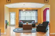 17 Picket Fence Lane, Calabash, NC 28467 — 3-bedroom waterfront home in The Farm, Calabash, NC, photo 11 of 37: Living Room Extension