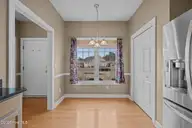 203 Neuchatel Court, New Bern, NC 28562 — 3-bedroom home in Taberna, New Bern, NC, photo 14 of 42: Breakfast Area