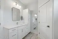 515 Bluff View Lane, Swansboro, NC 28584 — 4-bedroom waterfront home in Halls Creek North, Swansboro, NC, photo 17 of 39: vanity