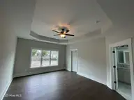 1478 Manta Ray Way, Sunset Beach, NC 28468 — 3-bedroom home in The Sanctuary at Sunset Beach, Sunset Beach, NC, photo 11 of 29: Owners Bedroom