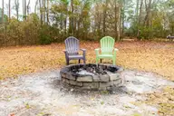 206 Hominy Court, Hubert, NC 28539 — 3-bedroom home in Ole Mill Village, Hubert, NC, photo 20 of 27: Fire pit