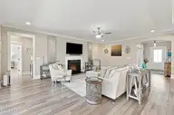1068 Snowden Road, Wilmington, NC 28412 — 3-bedroom home in Riverlights - Del Webb, Wilmington, NC, photo 15 of 74: 15_hallway & living area