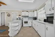 501 W Beach Drive, Oak Island, NC 28465 — 3-bedroom waterfront home in Long Beach, Oak Island, NC, photo 12 of 60