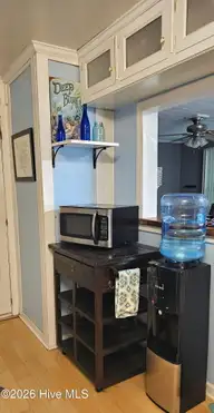 8248 Highway 70, Newport, NC 28570 — 2-bedroom home in Pine Acres, Newport, NC, photo 17 of 30: Marshall Microwave cart 2