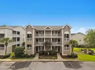 7509 Moorhen Lane SW # 1, Sunset Beach, NC 28468 — 2-bedroom condo in Sandpiper Bay, Sunset Beach, NC, photo 1 of 41