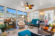 7568 Dunbar Drive SW, Sunset Beach, NC 28468 — 3-bedroom waterfront home in Sandpiper Bay, Sunset Beach, NC, photo 19 of 51: 4 Season Room