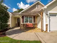 423 Blue Pennant Court, Sneads Ferry, NC 28460 — 3-bedroom home in Oyster Landing, Sneads Ferry, NC, photo 11 of 35: Front Patio
