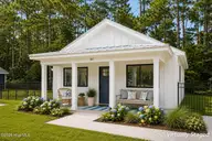 161 Long Pond Loop, Swansboro, NC 28584 — 2-bedroom waterfront condo in Cabins at Old Horse, Swansboro, NC, photo 1 of 23: Exterior Front Virtually Staged