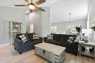 1128 Mill Run Road, Sneads Ferry, NC 28460 — 3-bedroom home in North Shore Country Club, Sneads Ferry, NC, photo 6 of 64: Living Room