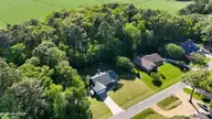 115 Bayshore Drive, Elizabeth City, NC 27909 — 3-bedroom home in Brickhouse Point, Elizabeth City, NC, photo 5 of 45: 5_dji_20260421163602_0004_d