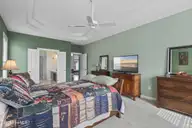 1013 Meadowlands Trail NW, Calabash, NC 28467 — 4-bedroom home in Meadowlands, Calabash, NC, photo 18 of 41: Owner's Suite