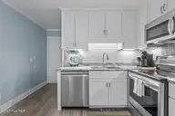 1404 Canal Drive Apt 11, Carolina Beach, NC 28428 — 2-bedroom condo in Ocean Harbor, Carolina Beach, NC, photo 11 of 48: 23-web-or-mls-DSC03884