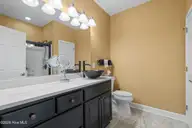 222 Pilothouse Place, Carolina Shores, NC 28467 — 3-bedroom condo in Beacon Townes, Carolina Shores, NC, photo 24 of 46: Ensuite Bathroom