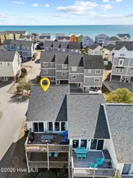 828 /102 N New River Drive 102, Surf City, NC 28445 — 4-bedroom waterfront townhome in Carolina Shores, Surf City, NC, photo 1 of 39: Exterior View 102