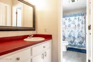 122 Purdie Drive, Emerald Isle, NC 28594 — 3-bedroom home in Oakland Hills, Emerald Isle, NC, photo 10 of 22: Ocean Moon Cottage 019 king bath