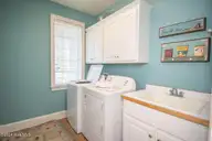 5715 Ocean Drive, Emerald Isle, NC 28594 — 8-bedroom waterfront home in Surf Landing Cove, Emerald Isle, NC, photo 21 of 64: Laundry