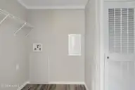 6777 Lewis Drive SE, Winnabow, NC 28479 — 3-bedroom manufactured home in Lewis Acres, Winnabow, NC, photo 22 of 22: Laundry room