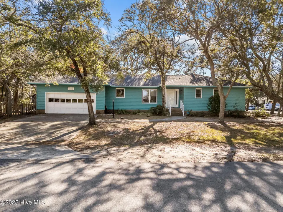 103 Throckmorton Street, Oak Island, NC 28465 — 3-bedroom home, Oak Island, NC, photo 1 of 57: 1-web-or-mls-DJI_20251209130952_0280_D