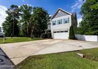 213 Creek View Circle, Sneads Ferry, NC 28460 — 4-bedroom waterfront home in Creeks Edge, Sneads Ferry, NC, photo 3 of 51: a front 3