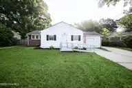 704 Henderson Drive, Jacksonville, NC 28540 — 3-bedroom home in Northwoods, Jacksonville, NC, photo 1 of 28