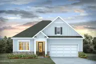 1252 Woodhouse Drive NW, Ash, NC 28420 — 4-bedroom home in Brunswick Plantation, Ash, NC, photo 1 of 17