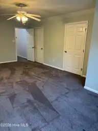102 Dockside Drive, Jacksonville, NC 28546 — 4-bedroom waterfront home in Hunters Creek, Jacksonville, NC, photo 15 of 33: bonus room closets