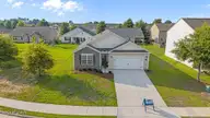 2706 Salisbury Lane W, Wilson, NC 27893 — 4-bedroom home in Bedford Place, Wilson, NC, photo 2 of 27: 3-custom-DJI_20250626180524_0099_D