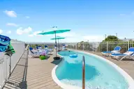 1213 Ocean Boulevard W, Holden Beach, NC 28462 — 7-bedroom waterfront home in Holden Beach West, Holden Beach, NC, photo 9 of 73: 1213OceanBlvdW - 16