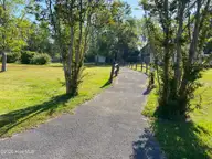 104 41 Anchorage Drive, Havelock, NC 28532 — lot in Moorings, Havelock, NC, photo 5 of 15: Path to Marina