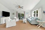 118 Periwinkle Drive, Emerald Isle, NC 28594 — 3-bedroom home in Shell Cove, Emerald Isle, NC, photo 6 of 39: 6 Living room, upstairs