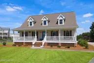 105 Franklin Court, Cedar Point, NC 28584 — 3-bedroom waterfront home in Cedar Point Beach, Cedar Point, NC, photo 1 of 53: 1 105 Franklin Court