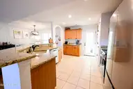 103 Spanish Moss Court, Hampstead, NC 28443 — 3-bedroom home in Forest At Belvedere, Hampstead, NC, photo 11 of 28: Large open kitchen